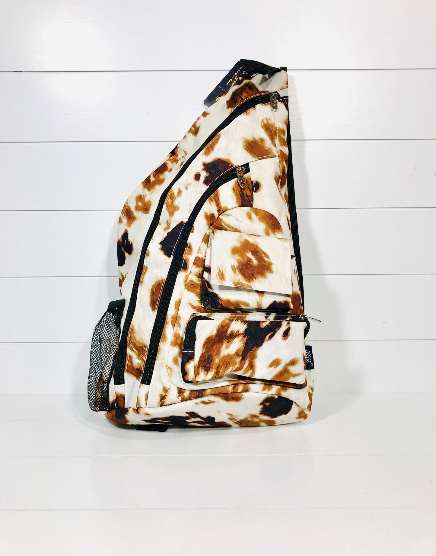 Cow Print Sling Backpack